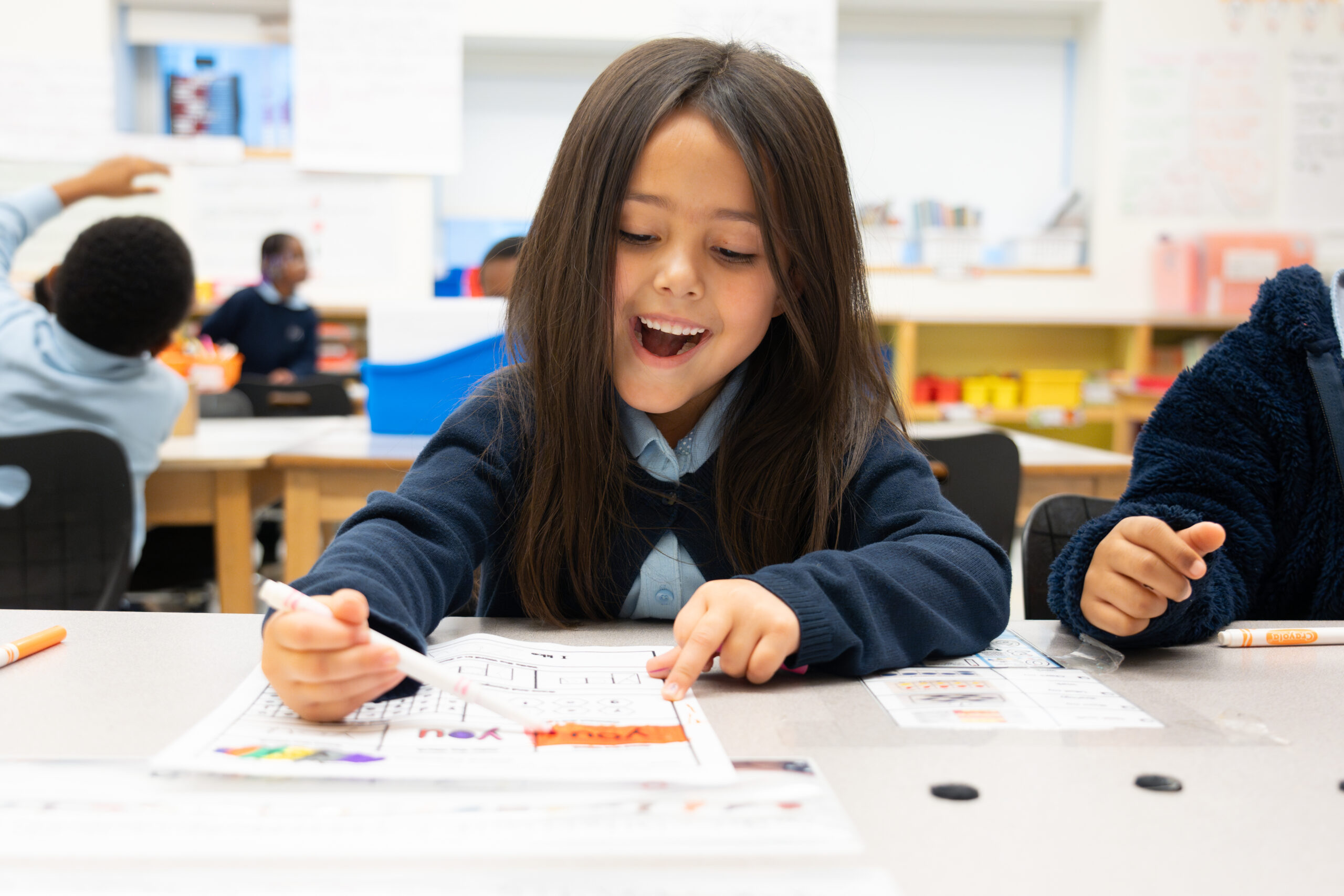 ES_K_student_smiling_coloring